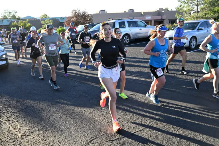 The half marathon field settles into its rhythm