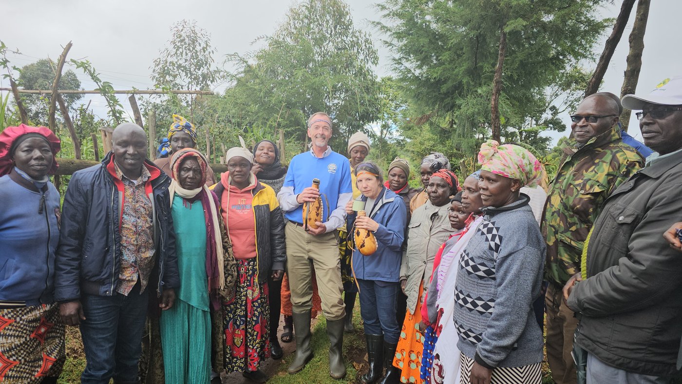 Community members in Kenya’s Rift Valley welcoming the WEFTA team, gourds presented in greeting